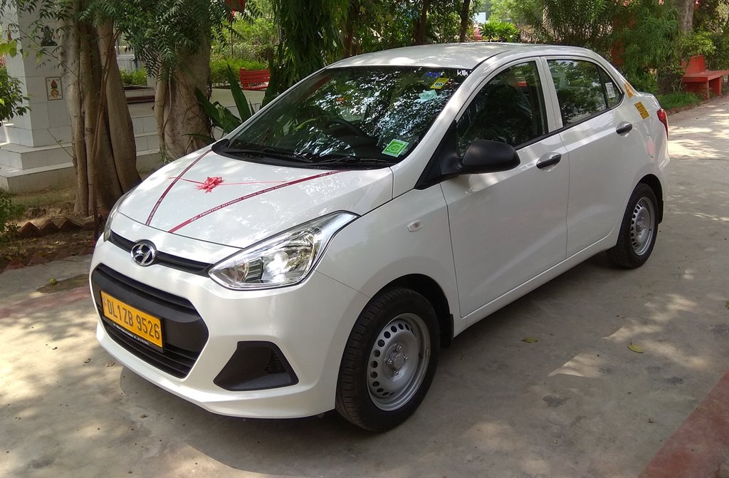 Hyundai Xcent sedan car rentals in India